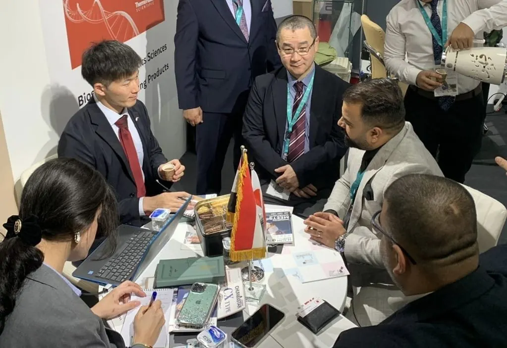 Product demonstration for visitors at a medical exhibition